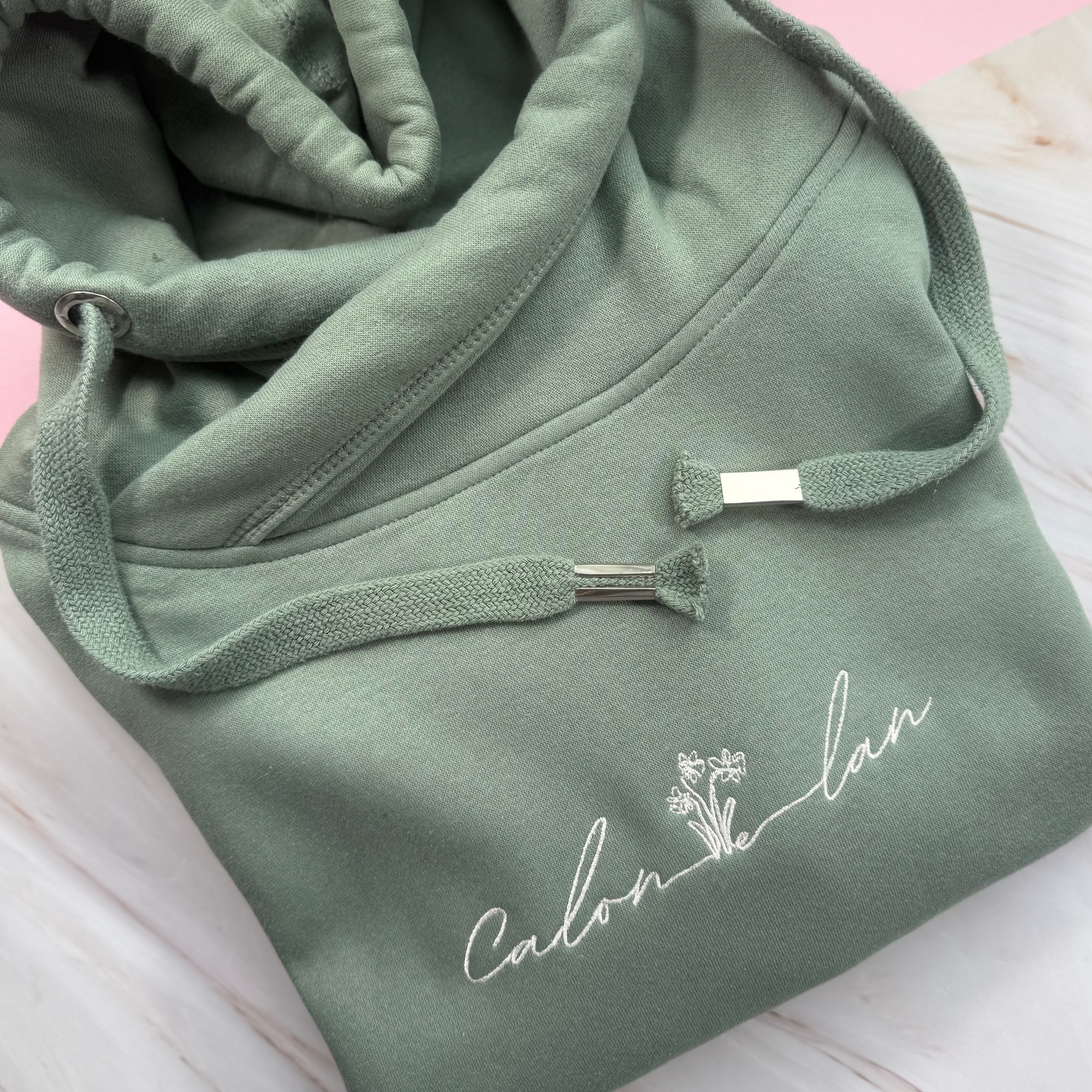 Dusky Green Cross neck hoodie with calon lan embroidered across the front